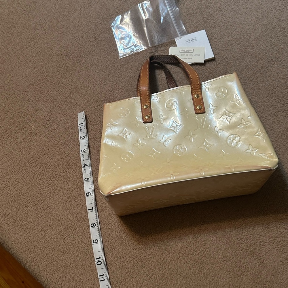 Authentic Louis Vuitton Cuir Verni in light yellow